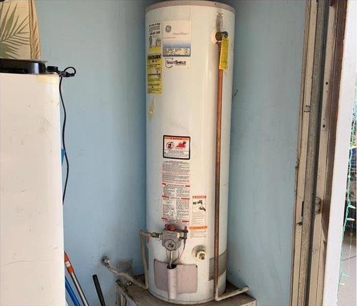 Water heater that has been damaged.